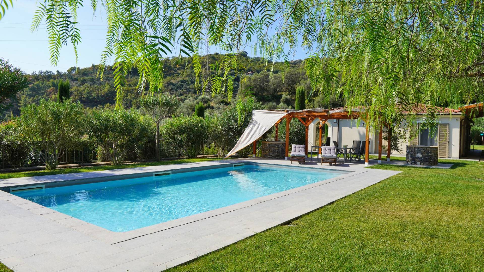 Imperia, villa for sale with a stunning pool and luxurious garden