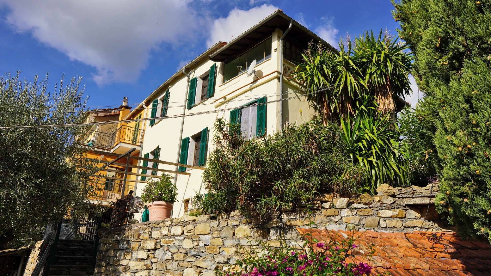 Bright semi detached town house for sale in Diano San Pietro with stunning countryside and sea views