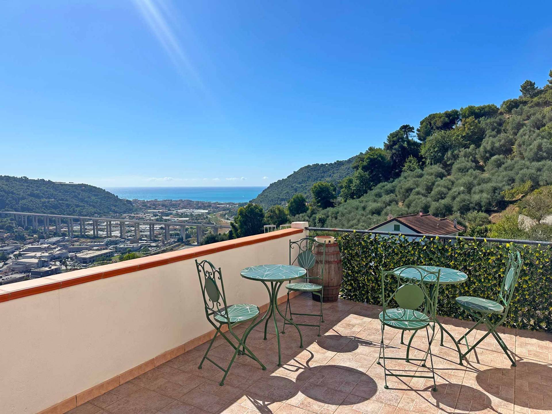 Large villa for sale in Camporosso with sea view, ample land, and two residential units